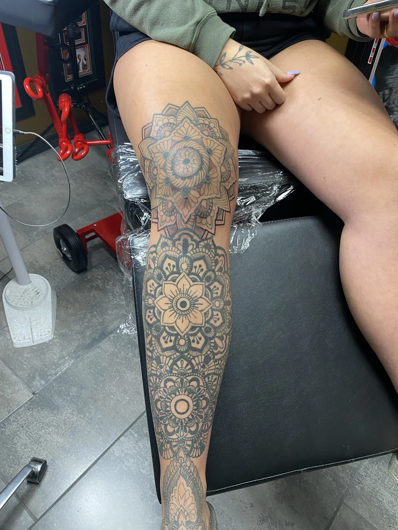 Full ornamental mandala leg sleeve tattoo by Josh Poindexter