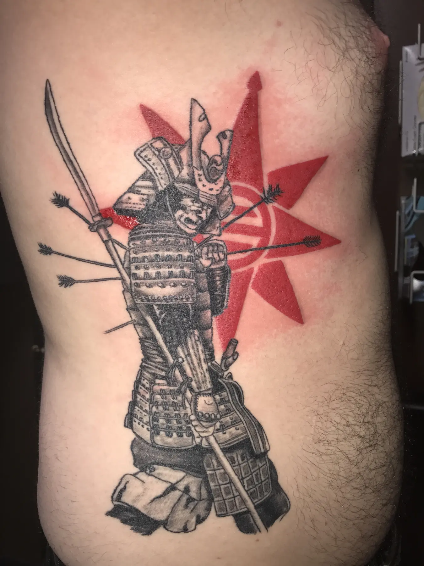 Black and red samurai warrior tattoo by Josh Poindexter